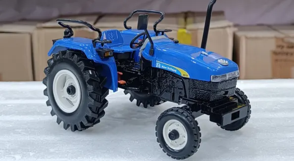Blue scale-model tractor &mdash; injection moulded miniature