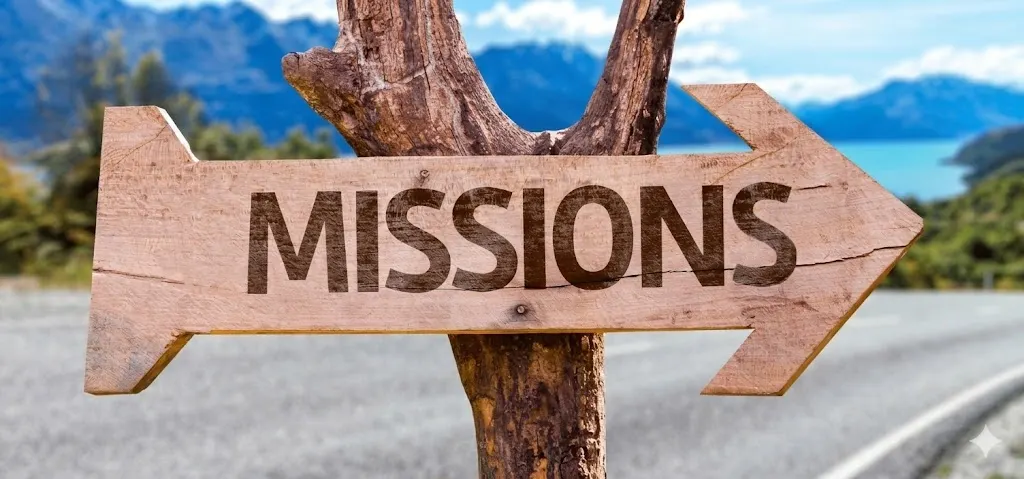 Wooden signpost reading Missions, illustrating the company mission